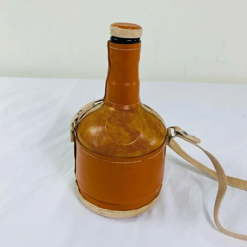 Brown Leather Tequila Decanter with silver cowboy